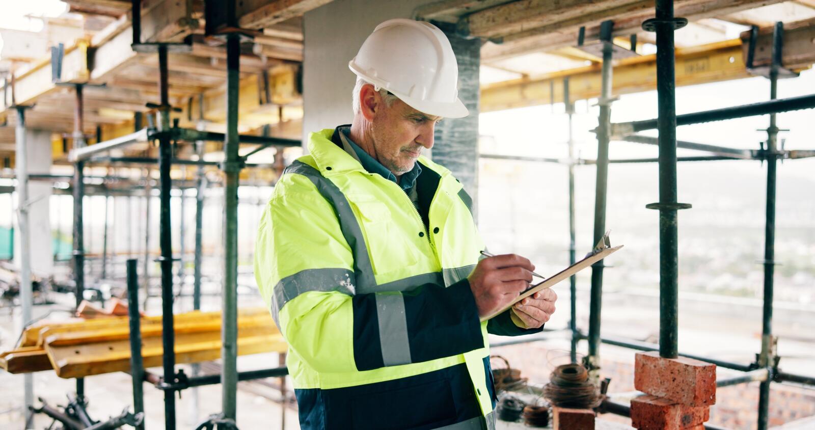 Man,,Inspection,And,Writing,On,Construction,Site,With,Clipboard,,Quantity